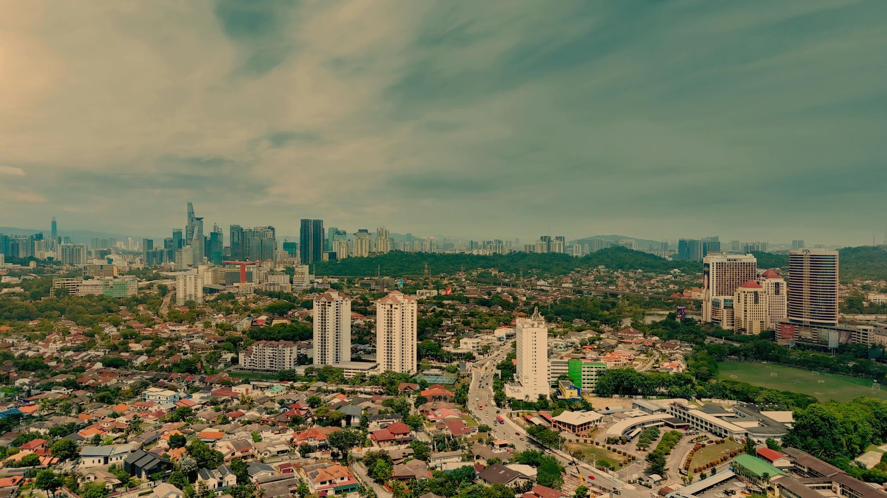 Aerial view over Petaling Jaya towards the Kuala Lumpur skyline