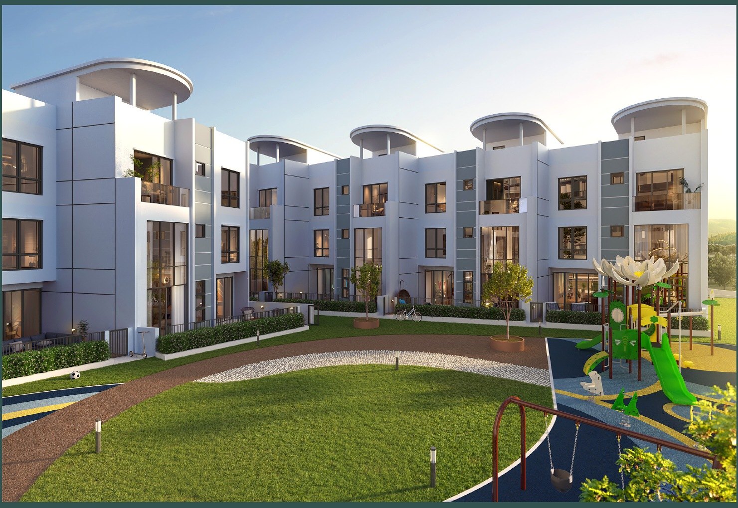 Town villas and the central lawn at Daya Residence