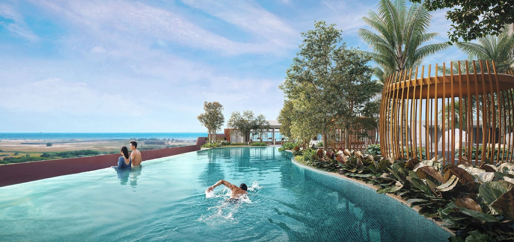 Infinity lap pool at Tagbay Suites with a view over the Melaka sea